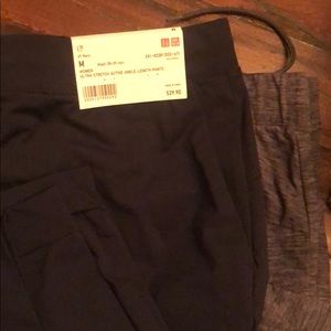 Two Uniqlo joggers. Navy and heather charcoal. M